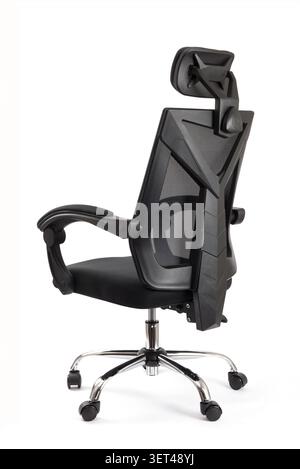 Modern black mesh office chair with headrest and wheels providing comfort and support Stock Photo