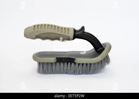 Scrubbing Brush with Handle Isolated on White Background. Stock Photo