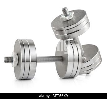 Steel adjustable dumbbells with stacked weight plates isolated on white background. Fitness equipment, home gym and strength training concepts. Stock Photo