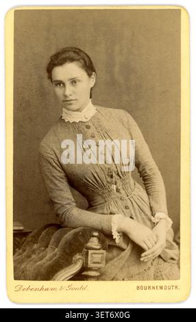 1880s Victorian photograph beautiful young woman in 20's, lovely lady, studio portrait by  Debenham & Gould, Bournemouth circa 1880. Stock Photo