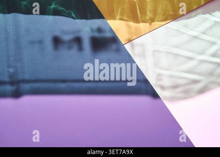 Multicolored Translucent Panels Intersecting Over Blurred Background With Violet Purple Pink Blue Tones And Layered Diagonal Composition On Flat Surface. Stock Photo