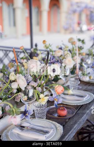 Fine art wedding table decor with flowers at Italian villa Stock Photo