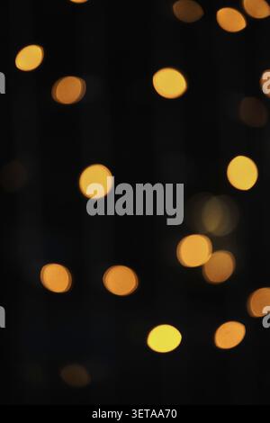 Abstract bokeh lights on dark background Stock Photo