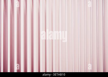 Striped ribbed vertical glass background Light pink vertical abstract texture Stock Photo