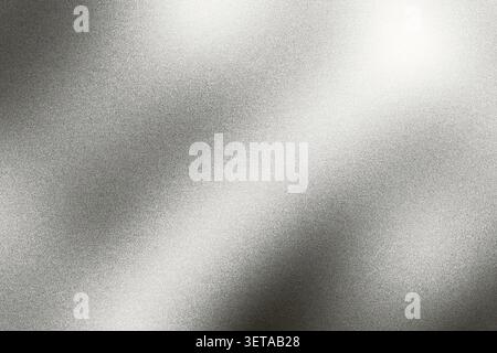 Abstract silver-gray grainy texture with shimmering light and dark diagonal areas Stock Photo