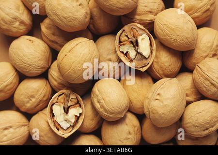 Walnuts in shell. background, close-up, view from above Stock Photo