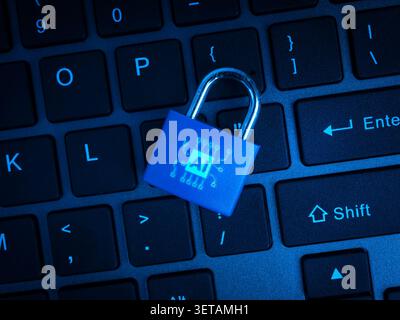 AI security and cybersecurity protection concept featuring digital padlock on computer keyboard background. Secure AI technology, data privacy, cyber Stock Photo