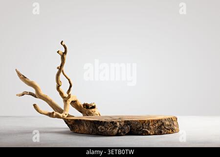 Minimalist Nature-Inspired Wooden Display Stand with Driftwood Aesthetic Stock Photo