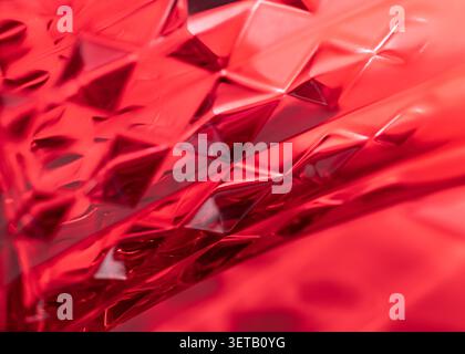 Abstract Geometric Red Pattern - Vibrant Glass Texture with Faceted Diamond Design Stock Photo