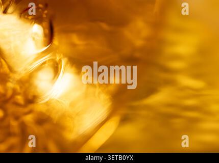 Golden Abstract Light Reflections with Warm Yellow Tones and Soft Texture Stock Photo