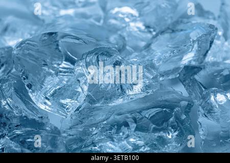 Close-up of Transparent Ice Blocks with Intricate Patterns in Cool Blue Tones Stock Photo