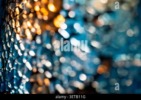 Abstract Bokeh Lights: Colorful Defocused Urban Nightscape with Blue and Orange Hues Stock Photo