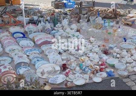 Overhead View of Antique Ceramic Plates and Porcelain at Feira da Ladra Flea Market, Lisbon Stock Photo