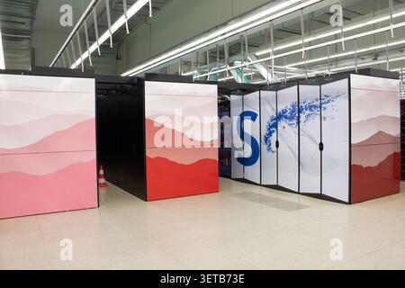 Lugano, Switzerland - 18 March 2026: View of the Swiss National Supercomputing Centre featuring rows of high-performance server cabinets with artistic Stock Photo