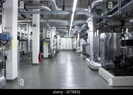Lugano, Ticino, Switzerland - 18 March 2026: View of the technical infrastructure and cooling pipes inside the Swiss National Supercomputing Centre in Stock Photo