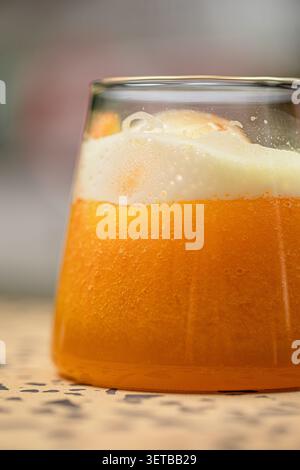 Fresh orange summer cocktail with white foam Stock Photo