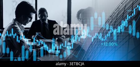 Multiracial group of managers sitting at desk at modern office Stock Photo