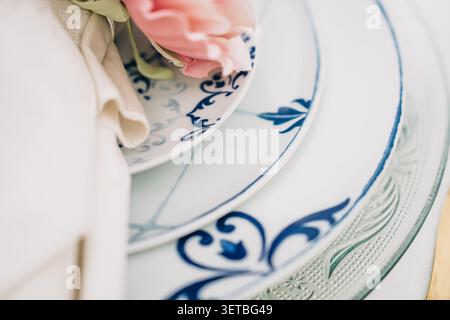 Elegant blue and white plates creating beautiful table setting Stock Photo