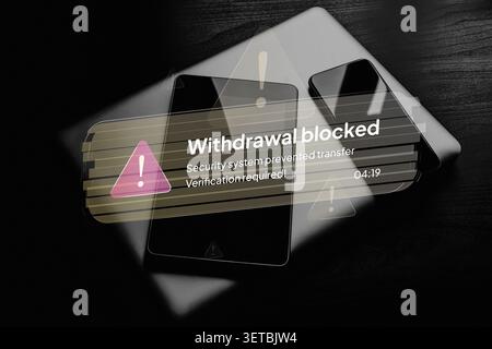 Withdrawal blocked alert on smartphone screen showing suspicious banking transfer and verification request. Financial fraud detection, mobile banking security and cybercrime prevention concept. Stock Photo