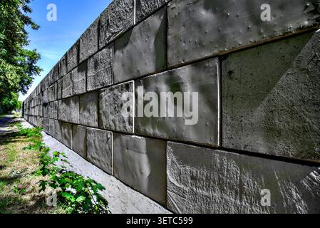 Retaining wall on building site made from large Lego concrete blocks - Preuilly-sur-Claise, Indre-et-Loire (37), France. Stock Photo
