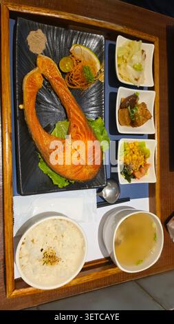 Grilled salmon steak set meal with rice and side dishes top view Stock Photo