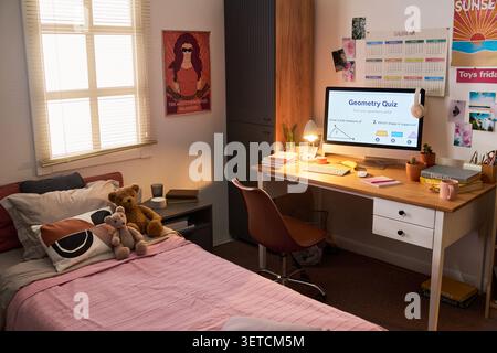 Teenage Students Bedroom Workspace Supporting Digital Learning Stock Photo