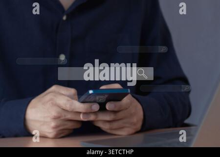 Technology Search Engine Optimization. man's hands are using a computer notebook to Searching for information. Stock Photo
