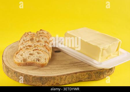 Slices of homemade sourdough bread and homemade butter. Stock Photo