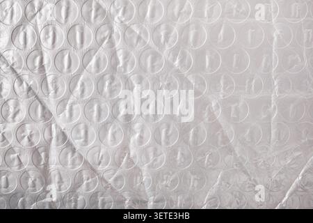 Close-up view showing textured surface of white bubble wrap packaging material Stock Photo