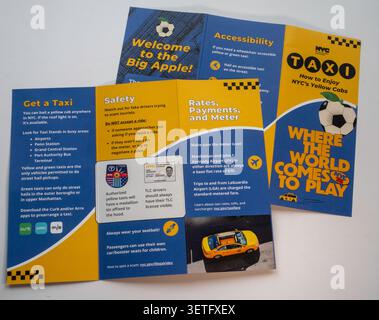 Still life of information flyer for successfully riding in iconic yellow taxi cabs, 2026, New York City, United States Stock Photo