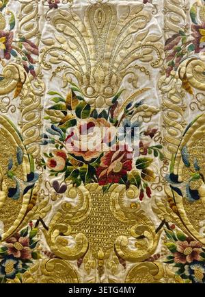 Fragment of an embroidered sacred vestment from the Diocesan Museum in the Cathedral of San Nicola. Stock Photo