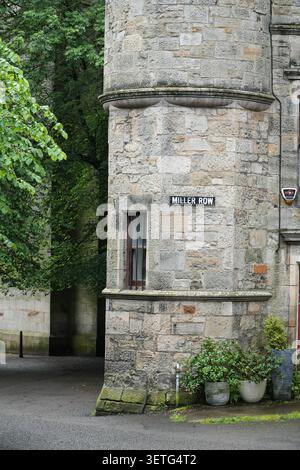Miller Row street sign on a historic stone building in Dean Village, Edinburgh. Stock Photo