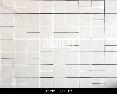 A view of a white ceramic tile surface, as a background. Stock Photo
