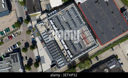 Aerial view of a large commercial data center in Diemen, supporting colocation, cloud services, artificial intelligence, big data and massive computin Stock Photo