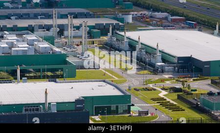 Aerial view of a massive hyperscale data center campus supporting cloud computing, big data, artificial intelligence and digital infrastructure. Stock Photo