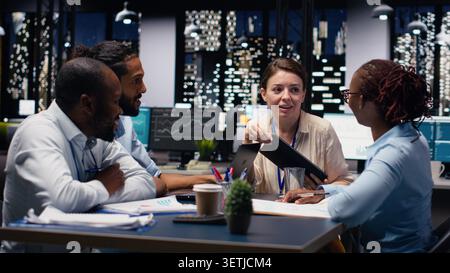 Leading diverse team, positive office culture and company manager fostering operational excellence. Delegating tasks, performance goals and team leader supervising administrative staff. Stock Photo