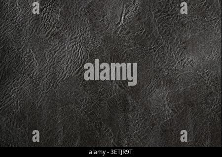 Black leather or leatherette as texture or background Stock Photo