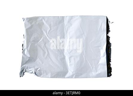 Torn used plastic bag isolated on white, top view, clipping path Stock Photo