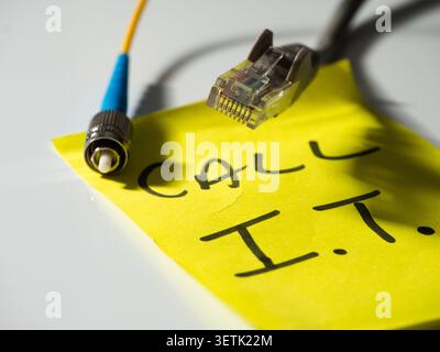 Reminder note to call network technician  Stock Photo