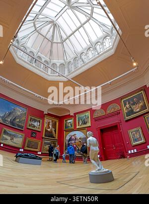 Leeds Art Gallery interior beneath a glazed roof with paintings and sculpture in Leeds, England, UK. Stock Photo