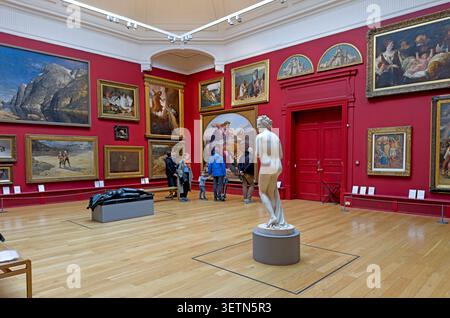 Leeds Art Gallery interior with visitors, paintings and sculpture in Leeds, West Yorkshire, England, UK. Stock Photo