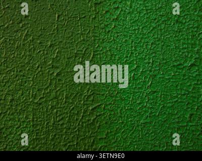 Old green painted metal showing cracked and peeling paint. Detailed grunge texture background with natural weathering effects. Stock Photo