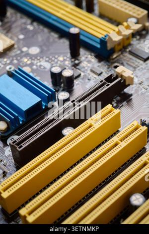 Close-up of a blue aluminum heat sink on an integrated circuit. Thermal performance in microelectronics engineering concept. Stock Photo