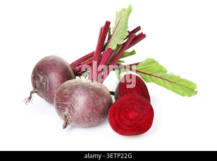 Whole and cut young beets with green leaves isolated on white Stock Photo