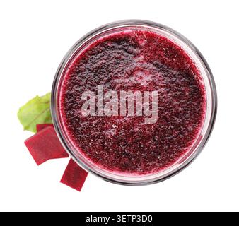 Beetroot juice in glass and fresh beet cubes isolated on white, top view Stock Photo