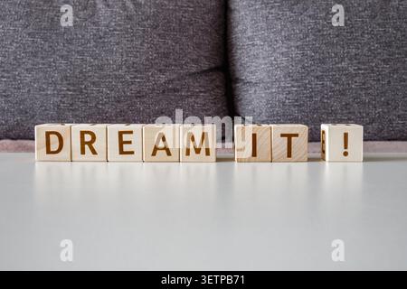 dream it ! motivational phrase made of letters on wooden cubes Stock Photo