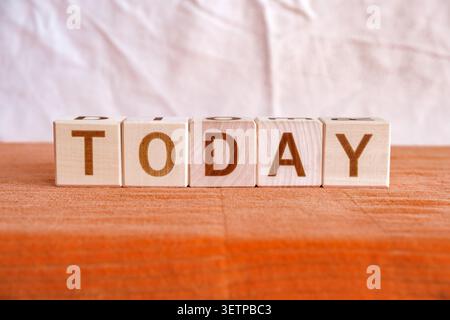 today, motivational word made of letters on wooden cubes Stock Photo