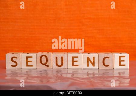 sequence, motivational word made of letters on wooden cubes Stock Photo