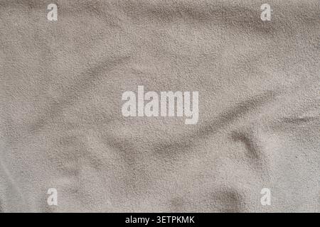 Detailed microfiber cloth texture in neutral gray color. High-resolution textile background suitable for modern graphic design. Stock Photo