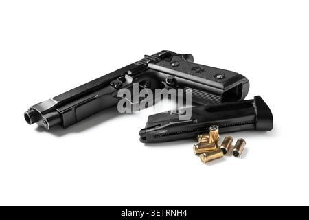 Black semi-automatic pistol with magazine and bullets Stock Photo